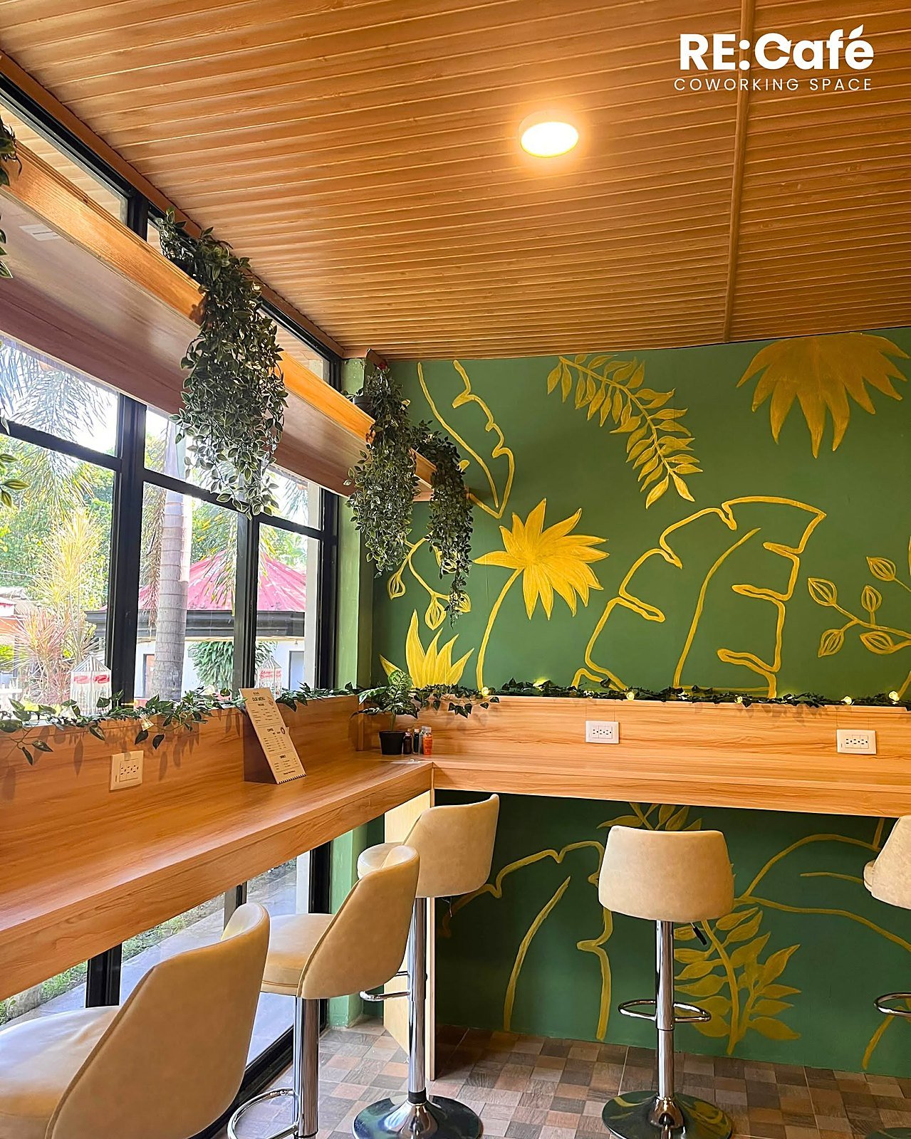 Green corner with plants at RE: Café Antique